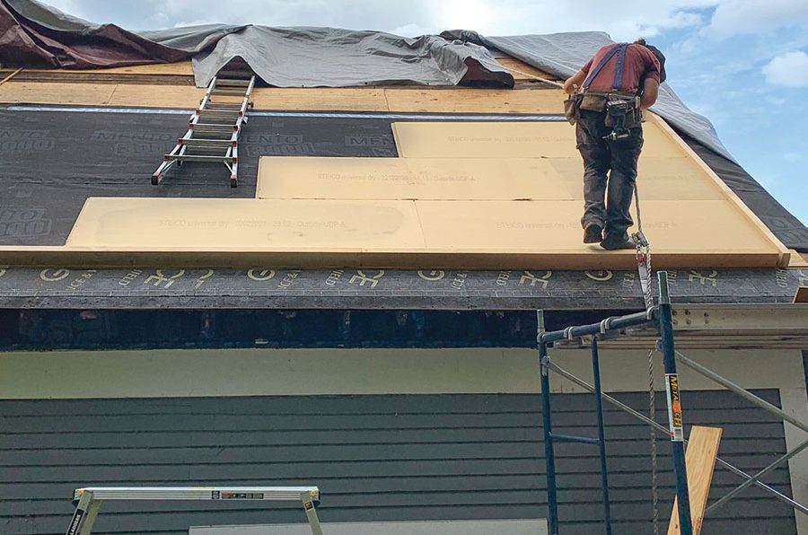 Wood-fiber insulation installed on top of the rafter