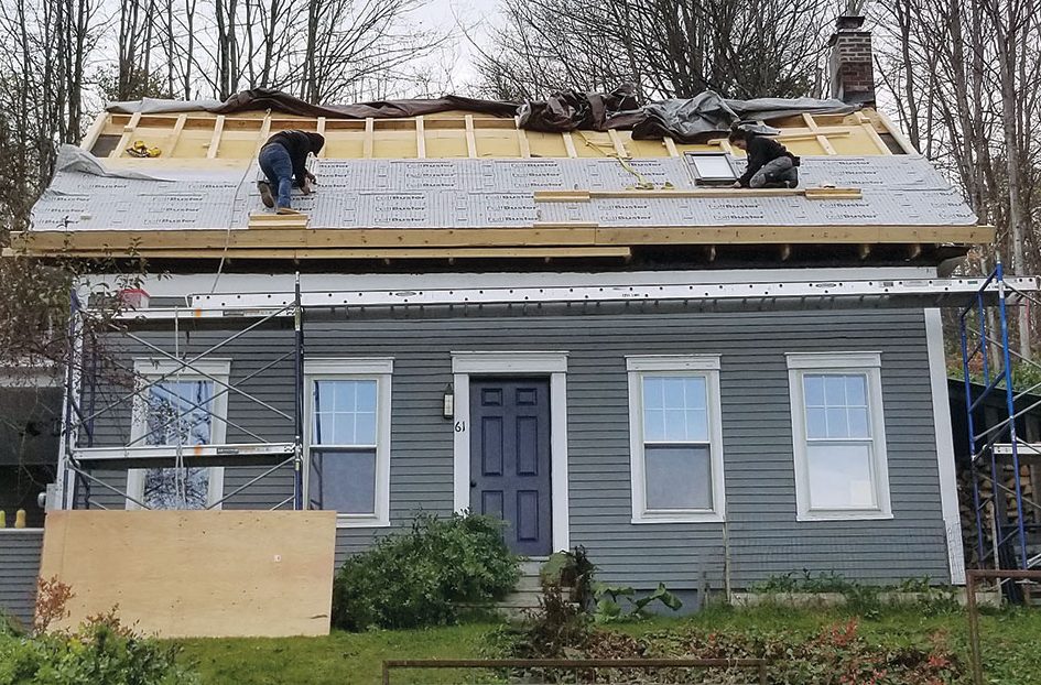 Synthetic roof underlayment on house
