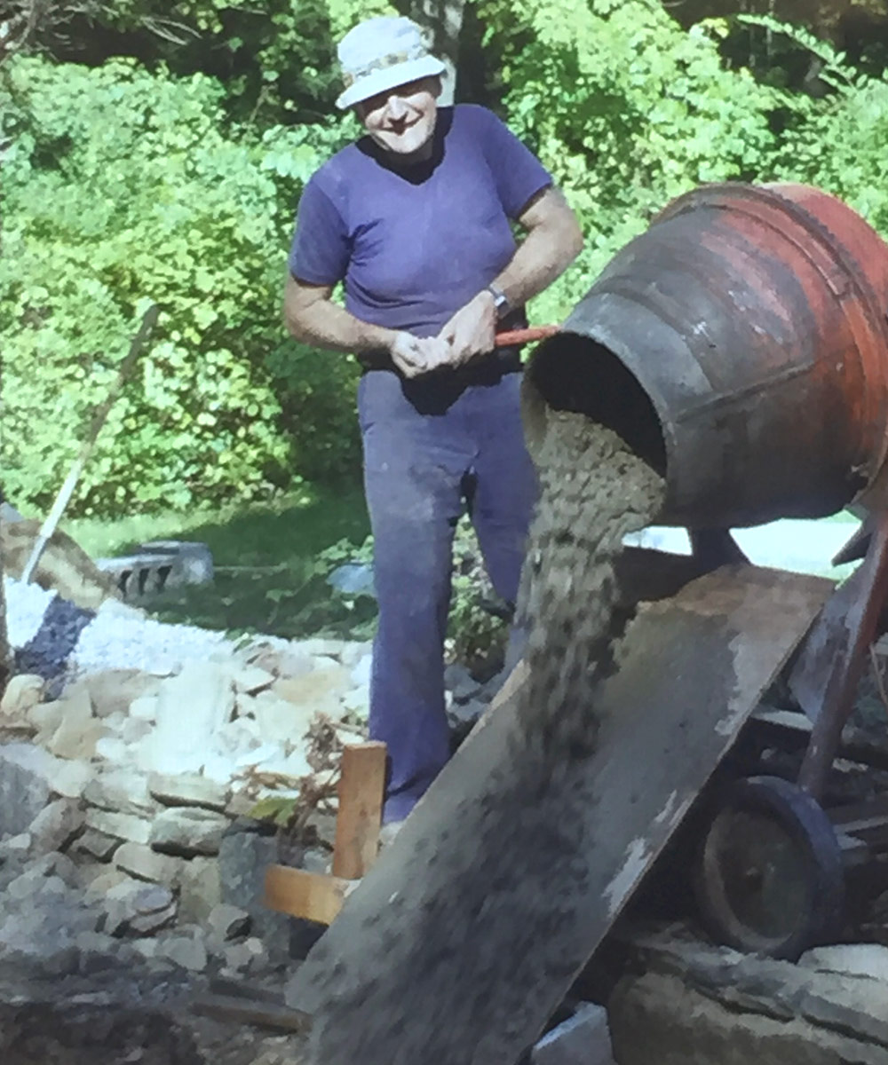 Tony operating the concrete mixer