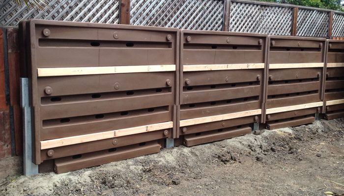 Thin, brown rainwater storage tanks