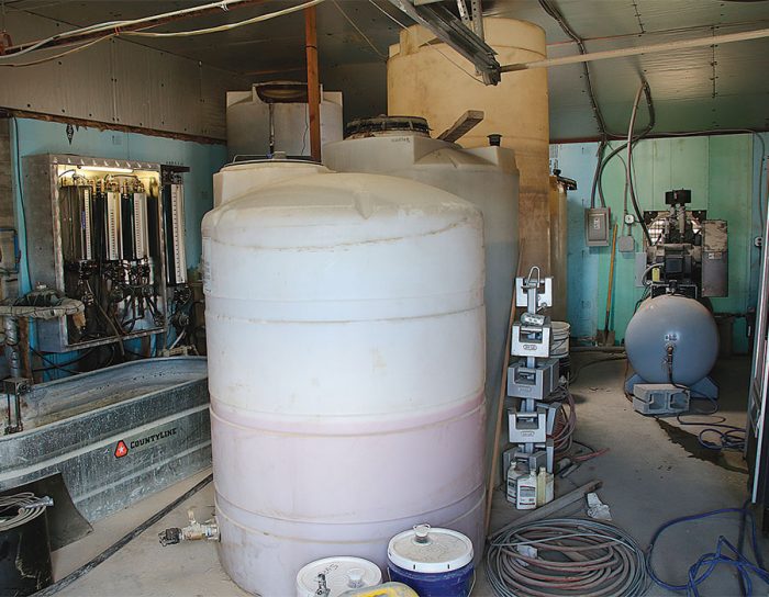 Admixtures like calcium chloride are dispensed by hand