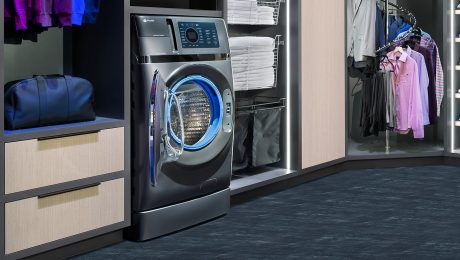 All-in-one washer and dryer tucked into a laundry area