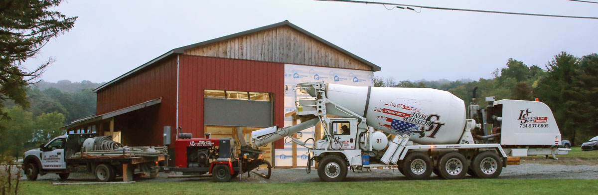 Make room for big rigs Both the concrete pump, which is pulled by a dually flatbed, and the front-discharge mixer are more than 30 ft. long, so you’ll need space for them to park. Also, consider road and bridge weight limits, as a loaded mixer weighs 73,000 lb.