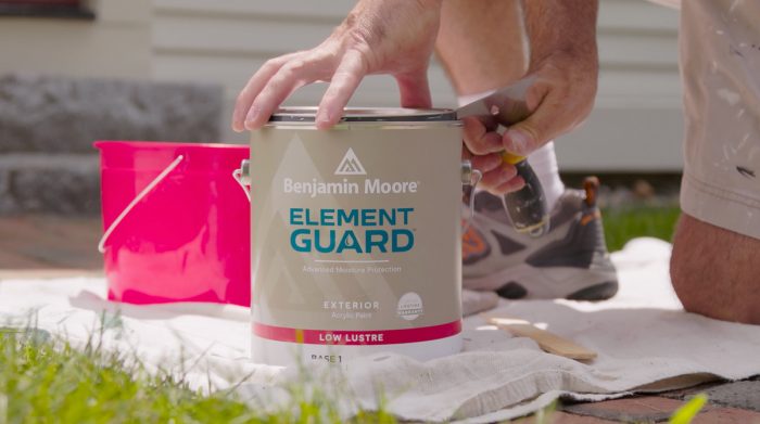 Gallon of Element Guard being opened