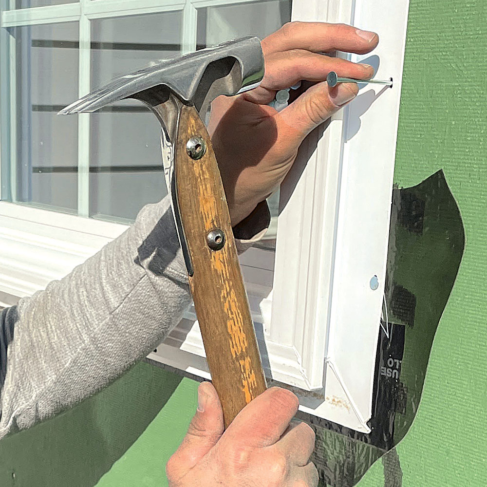 using 3-in. galvanized roofing nails to install the windows