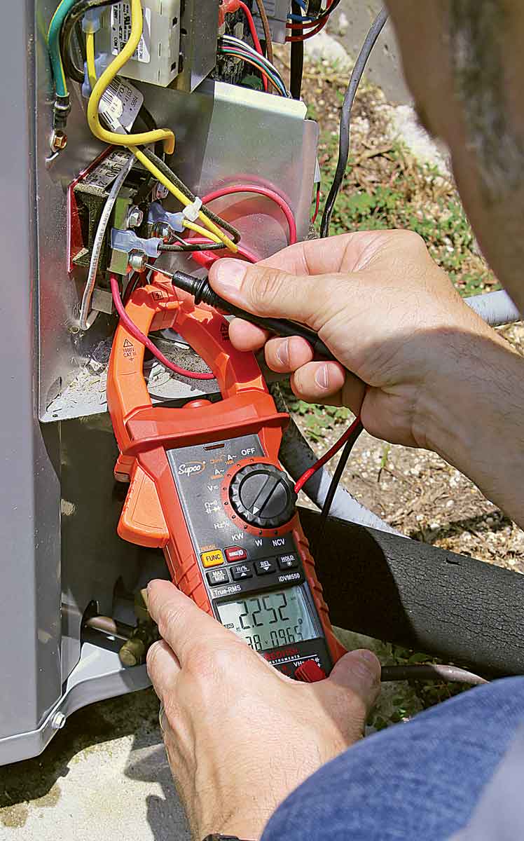 Check VOLTS AND WATTS OUTSIDE With the air handler still running at full speed or on test mode, I first use the test leads on a multimeter to measure the voltage on both legs supplying the terminal block on the outdoor unit. Finally I measure the watts consumed by the system’s outdoor unit with the system running at full speed by using a clamp-on multimeter.