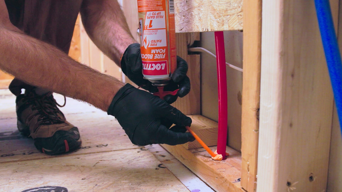 Insulating wire penetrations with Loctite Fire Block Foam