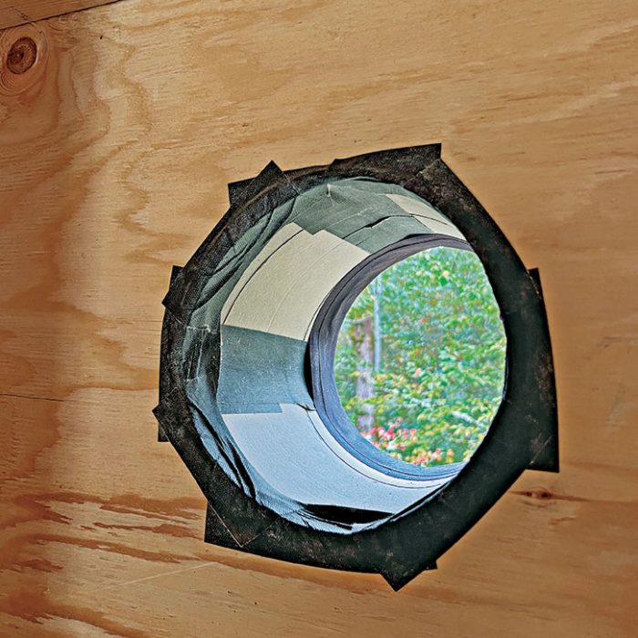 A large penetration hole in the wall panel