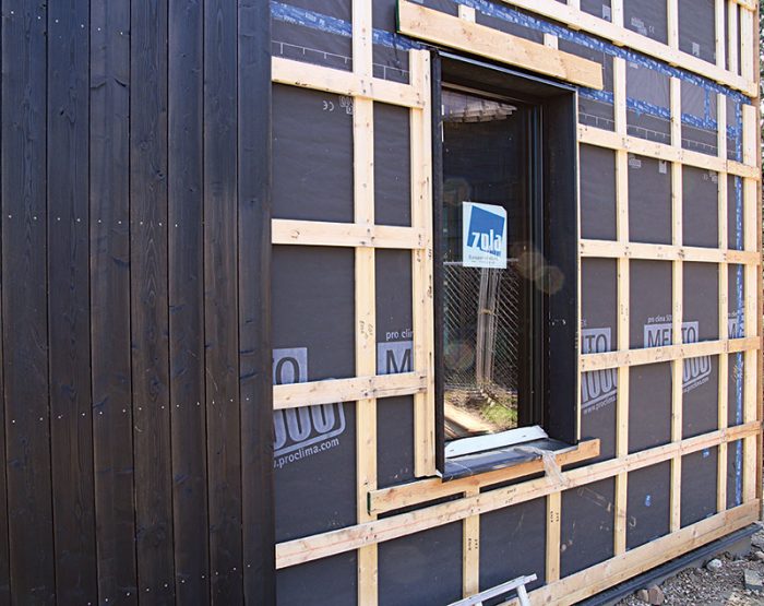 Battens and barrier around a window