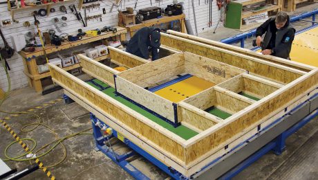 Assembling the components of a wall of a panelized house