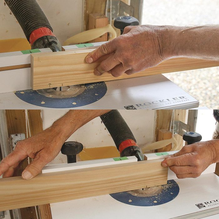 A photo of hands routing the stopped grooves.